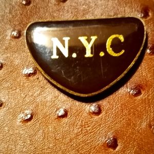 Used NYC clutch handbag